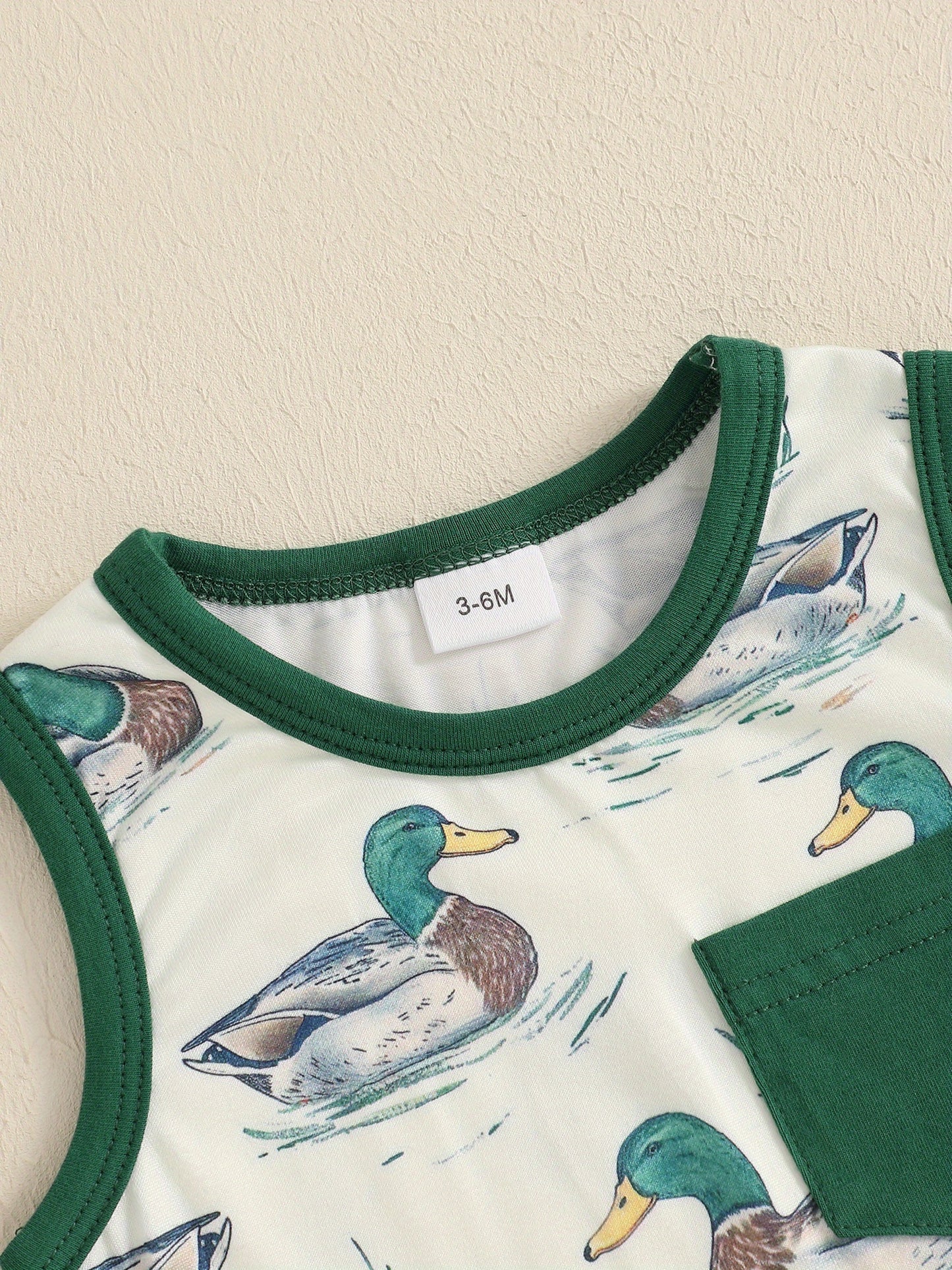 Baby Boy Duck Print Sleeveless Romper with Pocket Soft Polyester Blend Round Neck Light Blue with Green Trim Summer Bodysuit for Infants